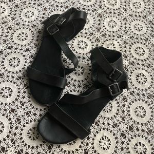 Black strappy buckle sandals
